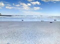 Sea Ã¢â¬â¹Ã¢â¬â¹surf sky sand sand beach stones on sand